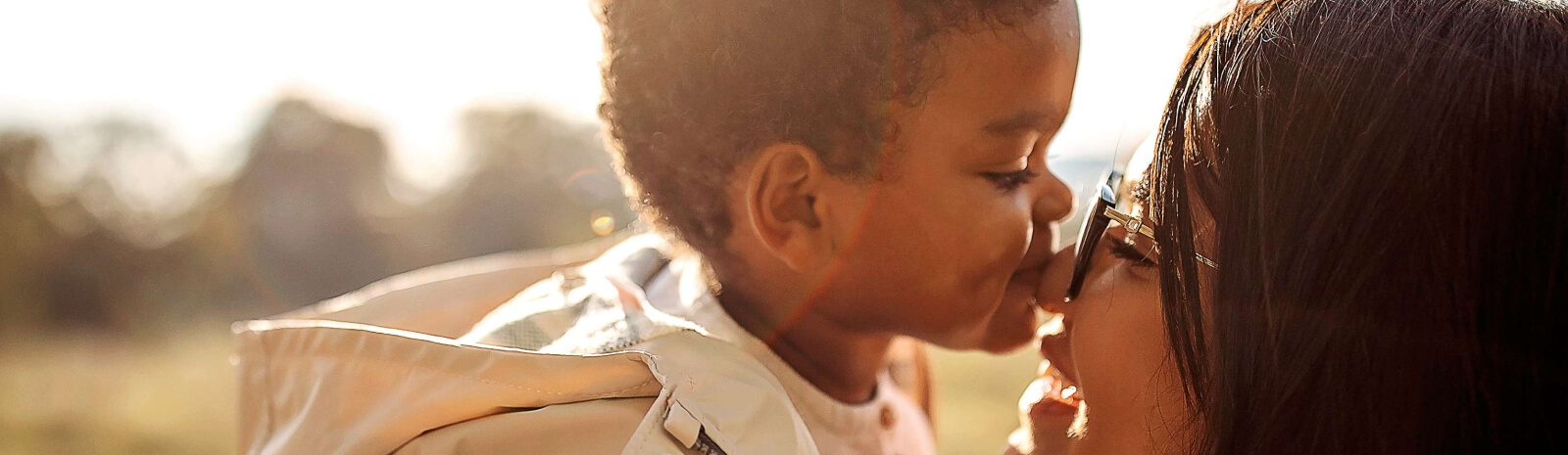 Son kissing mothers nose