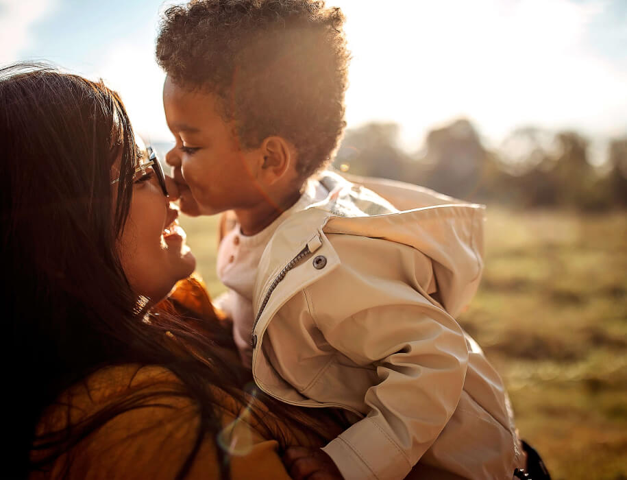 Son kissing mothers nose